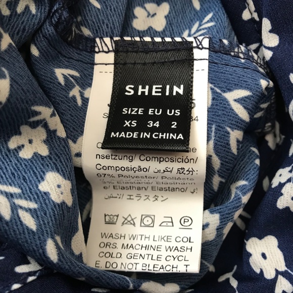 SHEIN Deep V-Neck Frill Tie Accent Floral Romper XS Dark Navy Blue White - Picture 14 of 16